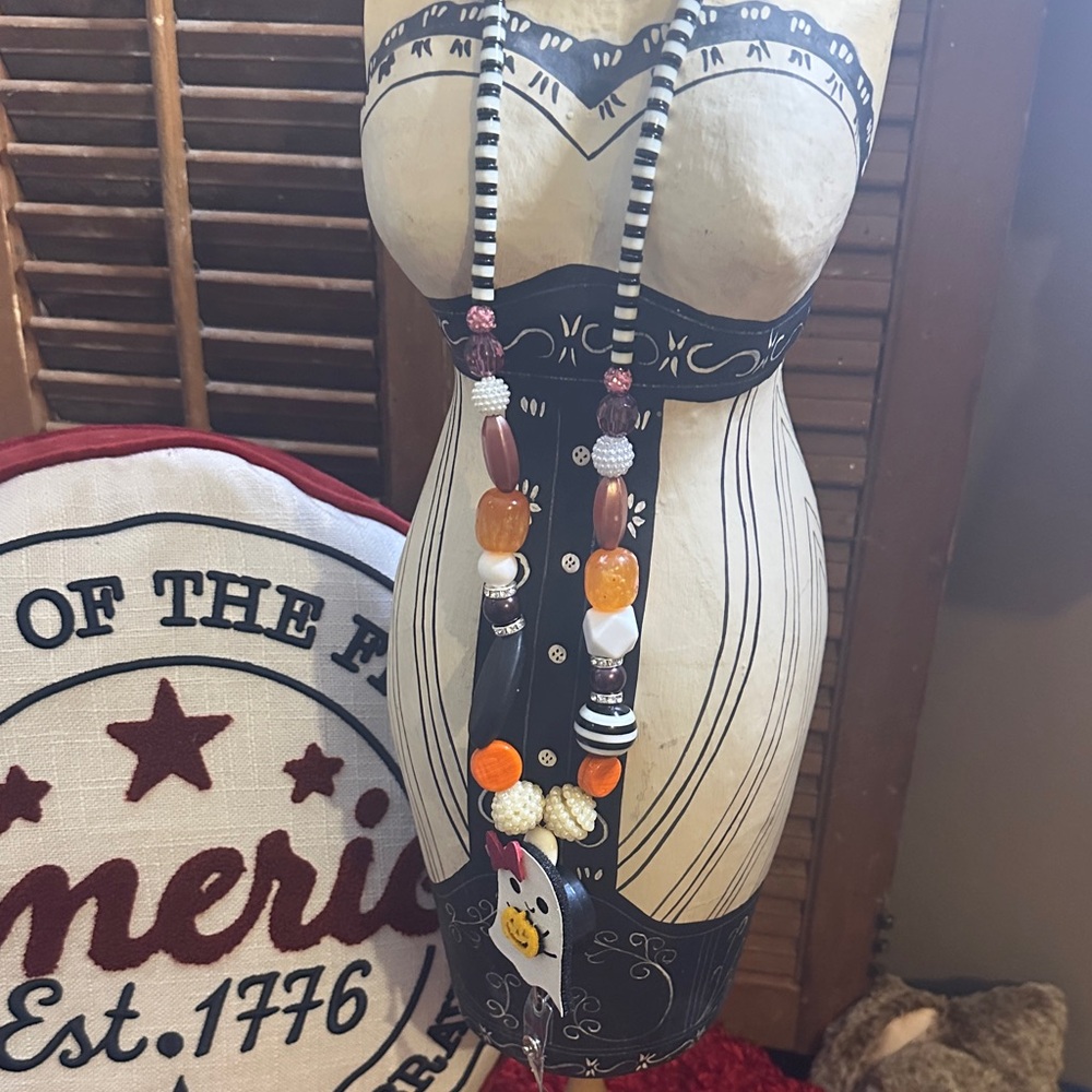 Beaded Necklace with Orange and Black Accents